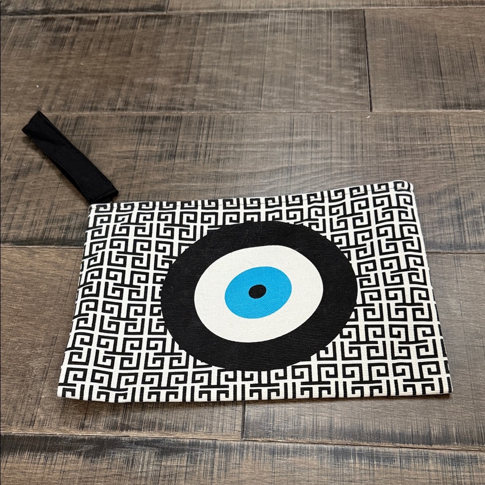Geometric Black and White Clutch with Blue Accent